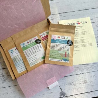 Box of 4 tea packets with menu