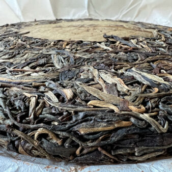 China Yunnan He Kai Shan Gu Shu Sheng Pu-erh Bing Cha