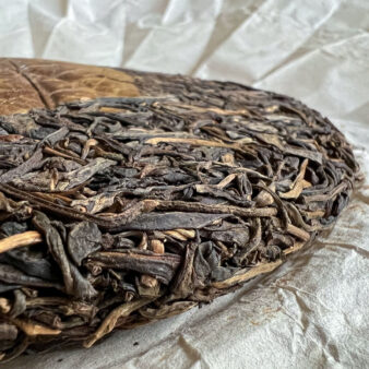 China Yunnan Kun Lu Shan Gu Shu Sheng Pu-erh Bing Cha